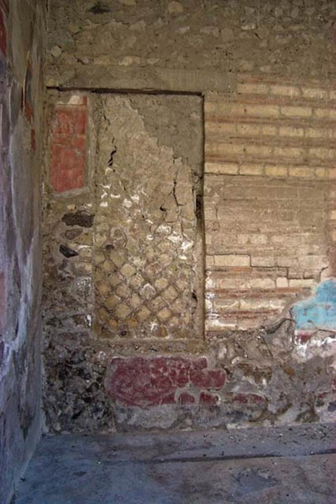 VI.17, Herculaneum. February 2003. South wall of tablinum, at east end.
Photo courtesy of Nicolas Monteix.